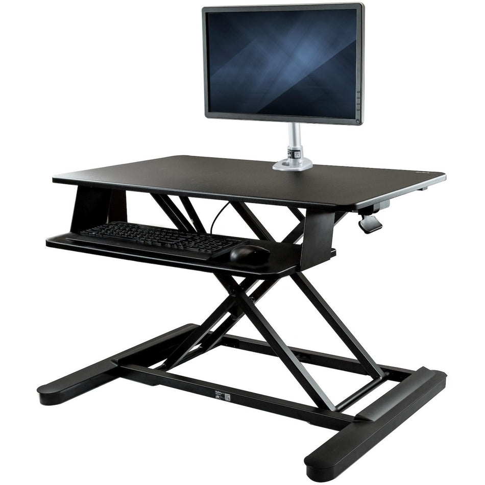 StarTech.com Sit-Stand Desk Converter with Monitor Arm - 35" Wide - Height Adjustable Standing Desk Solution - Arm for up to 30" Monitor - BNDSTSLGPVT